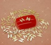 .40 Mini joias Douradas Chanel